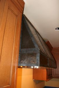 Copper Hood With Steel Strapping and Darkened Copper